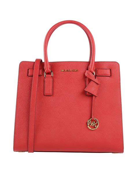 michael kors monogram with red handles|personalized michael kors bag.